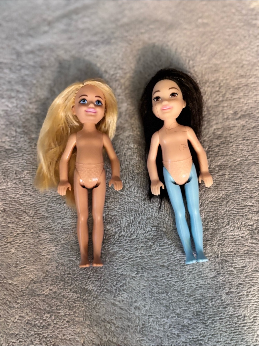 Two Barbie Chelsea dolls